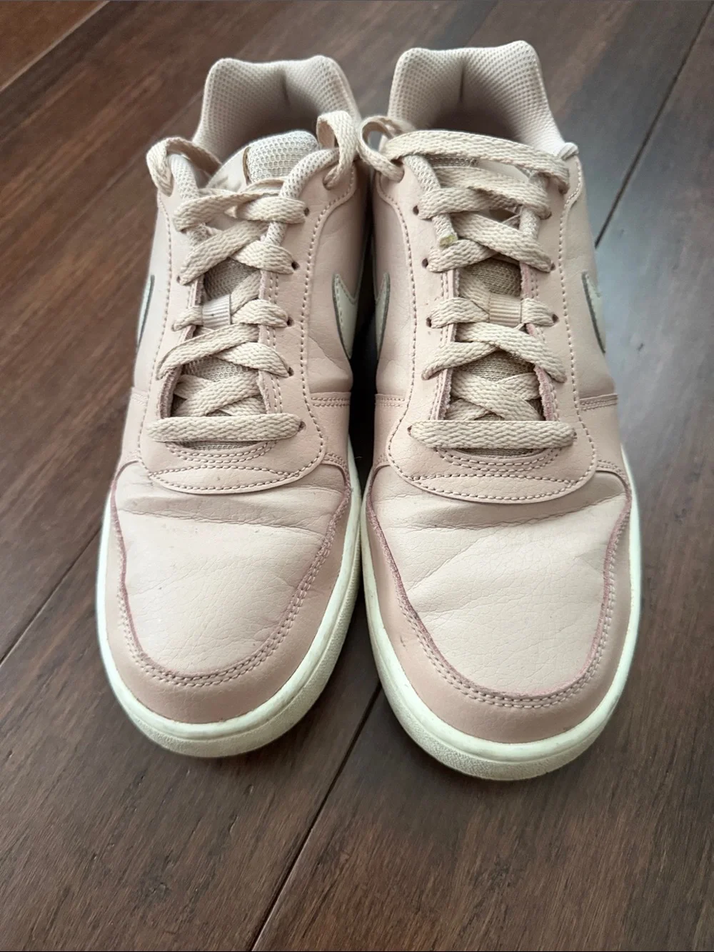 Nike Women's Blush Pink Low-Top Sneakers with Cream Swoosh